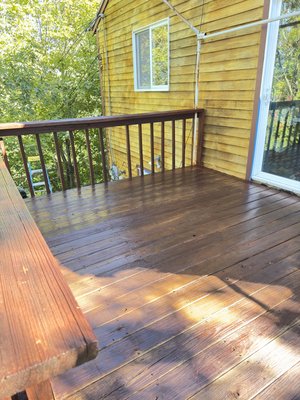 House renewed with siding chemical wash and Oil Stain - Cedar Tone applied - This house was washed with chemical and cleaned. We applied 01 Coat of Super Deck Oil based Transparent stain -  cedar tone.