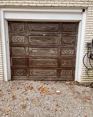 Door and opener replacement - Here is a replacement of an old wooden door with a fully insulated door with windows section and a belt opener