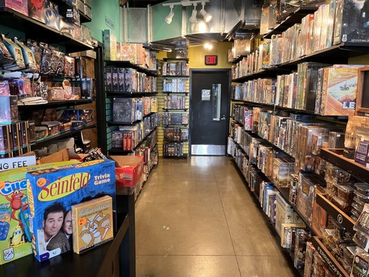 Retail Store - House Rules features a full retail game section with board games, cards games, Roll & Writes, Classic games, etc.. Many of these games area available to play in our Lounge, too. Retail Store - House Rules features a full retail game section with board games, cards games, Roll & Writes, Classic games, etc.. Many of these games area available to play in our Lounge, too.