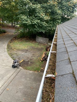 Gutter cleaning/ Moss removal November 2021 - We came out to this customers house the roof was covered in moss we scraped all the moss off the shingles and then added a moss killer to kill any of the remaining moss Particles. Gutter cleaning/ Moss removal November 2021 - We came out to this customers house the roof was covered in moss we scraped all the moss off the shingles and then added a moss killer to kill any of the remaining moss Particles.