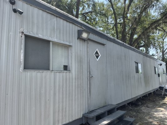 Mobile office clean - Before and after algae clean on exterior of a mobile office walls￼￼