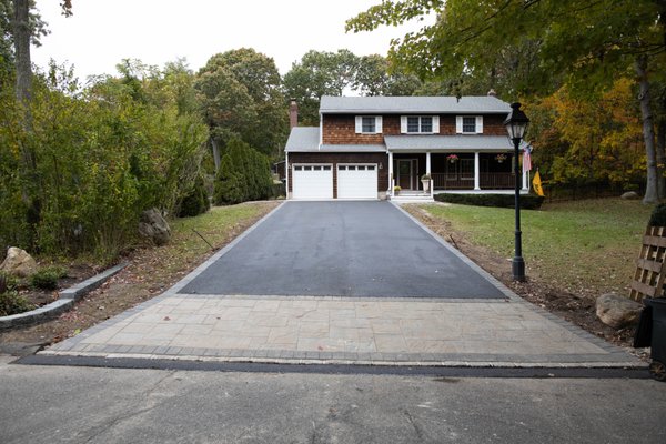 Driveway & Walkway Project - Some before and after images from a recent residential project. New driveway, walk-way, and some decorative block around the small garden in the front yard. If you're looking to get work like this done, or anything else interior and exterior related; give us a call!