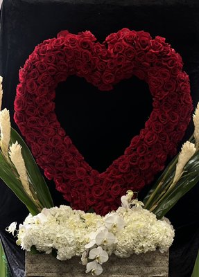 Valentine' Collection - "Step into a world of floral enchantment with our Valentine's Day Collection, where nature's finest blooms come together in a celebration of love and romance. Each arrangement is a masterpiece, carefully curated to evoke the tender emotions that define this special day.
Dive into a palette of rich reds, blush pinks, and verdant greens, as our skilled florists weave together an array of blossoms that symbolize the language of love. From the timeless elegance of red roses to the delicate allure of pink peonies, every arrangement tells a unique story of passion and affection.
Our collection embraces diversity, offering a range of designs to suit every style and sentiment. Whether you prefer a classic bouquet that speaks of enduring love or a modern composition that reflects the vibrancy of a new romance, our Valentine's Day Collection has something for everyone.
Immerse yourself in the beauty of our creations, each petal carefully chosen to convey sentiments that words may struggle to express. From subtle expressions of admiration to grand declarations of love, our floral arrangements are a visual symphony that resonates with the heart.
This Valentine's Day, elevate your celebration with the gift of nature's artistry. Let our curated collection be the messenger of your emotions, creating a memorable and enchanting experience for you and your loved ones. Embrace the beauty of love with our thoughtfully crafted floral arrangements, each one a testament to the magic that blooms when passion meets nature." Valentine' Collection - "Step into a world of floral enchantment with our Valentine's Day Collection, where nature's finest blooms come together in a celebration of love and romance. Each arrangement is a masterpiece, carefully curated to evoke the tender emotions that define this special day.
Dive into a palette of rich reds, blush pinks, and verdant greens, as our skilled florists weave together an array of blossoms that symbolize the language of love. From the timeless elegance of red roses to the delicate allure of pink peonies, every arrangement tells a unique story of passion and affection.
Our collection embraces diversity, offering a range of designs to suit every style and sentiment. Whether you prefer a classic bouquet that speaks of enduring love or a modern composition that reflects the vibrancy of a new romance, our Valentine's Day Collection has something for everyone.
Immerse yourself in the beauty of our creations, each petal carefully chosen to convey sentiments that words may struggle to express. From subtle expressions of admiration to grand declarations of love, our floral arrangements are a visual symphony that resonates with the heart.
This Valentine's Day, elevate your celebration with the gift of nature's artistry. Let our curated collection be the messenger of your emotions, creating a memorable and enchanting experience for you and your loved ones. Embrace the beauty of love with our thoughtfully crafted floral arrangements, each one a testament to the magic that blooms when passion meets nature."