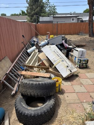 Yard & garage clean up before & after pictures - This was a yard & garage clean up of junk.