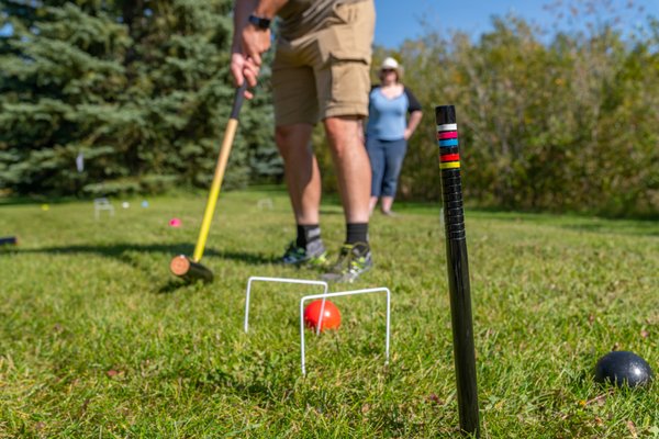 Croquet - Croquet is a classic lawn game that combines strategy and skill as players navigate a course, hitting wooden balls through hoops using mallets. It's a delightful game that encourages friendly competition and outdoor fun.
Embrace the elegance and charm of Croquet, a game that invites players to step into a world of strategic play and friendly competition. Whether you're a seasoned player or new to the game, Moose & Maple Games' Croquet rental guarantees a day of outdoor enjoyment, as you navigate the course, strategize your moves, and create lasting memories with family and friends. Croquet - Croquet is a classic lawn game that combines strategy and skill as players navigate a course, hitting wooden balls through hoops using mallets. It's a delightful game that encourages friendly competition and outdoor fun.
Embrace the elegance and charm of Croquet, a game that invites players to step into a world of strategic play and friendly competition. Whether you're a seasoned player or new to the game, Moose & Maple Games' Croquet rental guarantees a day of outdoor enjoyment, as you navigate the course, strategize your moves, and create lasting memories with family and friends.
