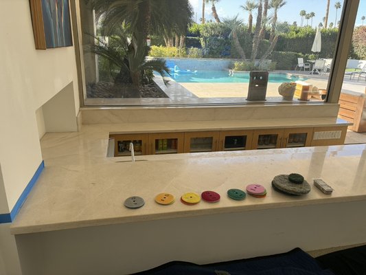 Limestone counter top testoration Indian Wells Country Club 2026 - This bar was very stained from years of use. we brought it back to life. We honed down, even it out, polished and seal.