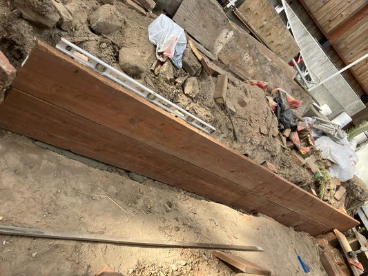 Retaining Wall - This is a residential retaining wall that we successfully repaired, addressing both cosmetic and structural issues. The repair work involved reinforcing the foundation, restoring stability, and ensuring proper drainage to prevent future erosion or damage. Our team carefully matched the existing materials to maintain the aesthetic appeal while enhancing the wall’s long-term durability and functionality. The result is a secure, well-maintained retaining wall that will continue to protect the property for years to come Retaining Wall - This is a residential retaining wall that we successfully repaired, addressing both cosmetic and structural issues. The repair work involved reinforcing the foundation, restoring stability, and ensuring proper drainage to prevent future erosion or damage. Our team carefully matched the existing materials to maintain the aesthetic appeal while enhancing the wall’s long-term durability and functionality. The result is a secure, well-maintained retaining wall that will continue to protect the property for years to come