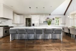 Cosmopolitan Kitchen, St. Charles illinois - A huge success, the client loves this kitchen. We upgraded the style by adding transitional features like beautiful custom kitchen cabinets in light stylish tones, high-end appliances, a quartzite countertop, and backsplash. The thoughtful design expanded the kitchen storage and helped showcase this fantastic space's grandeur. Cosmopolitan Kitchen, St. Charles illinois - A huge success, the client loves this kitchen. We upgraded the style by adding transitional features like beautiful custom kitchen cabinets in light stylish tones, high-end appliances, a quartzite countertop, and backsplash. The thoughtful design expanded the kitchen storage and helped showcase this fantastic space's grandeur.