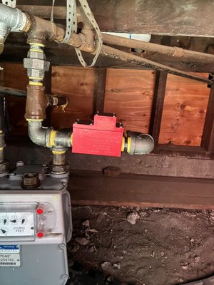 Installing earthquake valve - Techs installed automatic earthquake shut off valve Installing earthquake valve - Techs installed automatic earthquake shut off valve