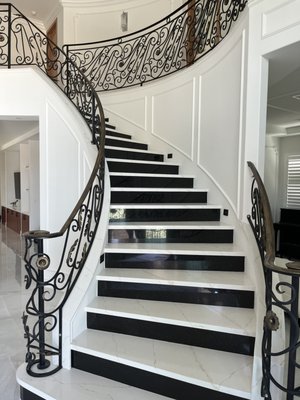 Custom Stair Railing - We specialize in creating custom wrought iron railing designs for interior staircases. A dramatic staircase isn't complete without an equally stunning and sophisticated railing, and that's where we come in.
Our wrought iron railings are not only visually stunning, but they are also crafted with the highest quality in mind. It all starts with a visit to your home, where we gather ideas and take precise measurements. From there, we dream up the perfect design to complement your style and architecture.
What sets us apart is our dedication to craftsmanship. We hand-forge every piece of our railings using traditional blacksmithing methods that have been perfected over thousands of years. This ensures that each railing is not only visually appealing but also durable and built to last.
Once your custom railings are ready, we deliver them to your home and handle the installation process with the utmost care and precision. We won't leave until everything is absolutely perfect. Our attention to detail and commitment to customer satisfaction are what make us the premier wrought iron company in Southern California.
Why settle for run-of-the-mill banisters or railings when you can have a one-of-a-kind, custom creation? Whether you're building a new home or updating your existing staircase, our custom wrought iron designs will elevate the aesthetic and add a touch of elegance to your space.
Contact SchuVega Ironworks today to schedule a free estimate for your custom creations. As a family-owned and operated business, we take immense pride in all of our work. We carefully select stock factory metal to forge gorgeous custom wrought iron designs that will leave a lasting impression. Don't miss this opportunity to enhance your staircase with a truly unique and captivating railing. Engage with us today and let us bring your vision to life. Your satisfaction is guaranteed with SchuVega Ironworks Custom Stair Railing - We specialize in creating custom wrought iron railing designs for interior staircases. A dramatic staircase isn't complete without an equally stunning and sophisticated railing, and that's where we come in.
Our wrought iron railings are not only visually stunning, but they are also crafted with the highest quality in mind. It all starts with a visit to your home, where we gather ideas and take precise measurements. From there, we dream up the perfect design to complement your style and architecture.
What sets us apart is our dedication to craftsmanship. We hand-forge every piece of our railings using traditional blacksmithing methods that have been perfected over thousands of years. This ensures that each railing is not only visually appealing but also durable and built to last.
Once your custom railings are ready, we deliver them to your home and handle the installation process with the utmost care and precision. We won't leave until everything is absolutely perfect. Our attention to detail and commitment to customer satisfaction are what make us the premier wrought iron company in Southern California.
Why settle for run-of-the-mill banisters or railings when you can have a one-of-a-kind, custom creation? Whether you're building a new home or updating your existing staircase, our custom wrought iron designs will elevate the aesthetic and add a touch of elegance to your space.
Contact SchuVega Ironworks today to schedule a free estimate for your custom creations. As a family-owned and operated business, we take immense pride in all of our work. We carefully select stock factory metal to forge gorgeous custom wrought iron designs that will leave a lasting impression. Don't miss this opportunity to enhance your staircase with a truly unique and captivating railing. Engage with us today and let us bring your vision to life. Your satisfaction is guaranteed with SchuVega Ironworks