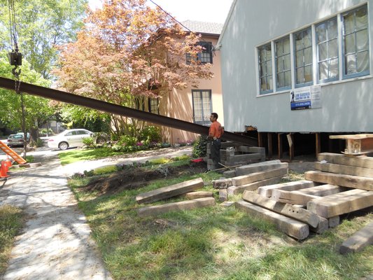 Basement Digouts - A basement digout refers to the excavation and demolition of all or part of the current basement or crawlspace for the purpose of creating additional storage and/or living space under your home.  This involves supporting the structure, removing a lot of dirt and old foundations, and excavating typically to 9' with the intent of creating a new 8' finsihed ceiling. New foundations and retaining walls are then built, proper drainage is put in, a new concrete floor is installed, post and beam structures are put in place if need to create more open areas, and structural walls are installed.  From a single room to an entire basement mirroring the house upstairs, we are creating the raw space to get remodeled (by others).