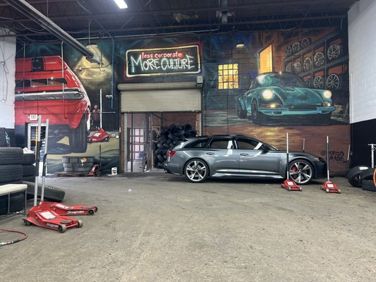Less Corporate. More Culture. A Community Canvas Inside Radial Tire Co. - At Radial Tire Co., we believe a tire shop should reflect the people who walk through its doors. That's why we partnered with local artist Rodrigo Pradel to create a custom mural that celebrates our passion for cars, our customers, and the community we've proudly served for nearly 50 years.
More than just artwork, the mural embodies the spirit of Radial Tire: authentic, approachable, and deeply connected to automotive culture. It transforms our shop into a space where motorsports enthusiasts, daily drivers, and car club members feel at home.
This project is a reminder that we're more than a tire store. We're a gathering place for enthusiasts, a supporter of local artists, and a business rooted in the culture of the communities we serve.
Next time you're in the shop, take a look. Radial Tire Co. | Silver Spring, Maryland
Serving Silver Spring, Wheaton, Kensington, Bethesda, Chevy Chase, Washington DC, and surrounding communities.
Real service. Real people. Real culture. Less Corporate. More Culture. A Community Canvas Inside Radial Tire Co. - At Radial Tire Co., we believe a tire shop should reflect the people who walk through its doors. That's why we partnered with local artist Rodrigo Pradel to create a custom mural that celebrates our passion for cars, our customers, and the community we've proudly served for nearly 50 years.
More than just artwork, the mural embodies the spirit of Radial Tire: authentic, approachable, and deeply connected to automotive culture. It transforms our shop into a space where motorsports enthusiasts, daily drivers, and car club members feel at home.
This project is a reminder that we're more than a tire store. We're a gathering place for enthusiasts, a supporter of local artists, and a business rooted in the culture of the communities we serve.
Next time you're in the shop, take a look. Radial Tire Co. | Silver Spring, Maryland
Serving Silver Spring, Wheaton, Kensington, Bethesda, Chevy Chase, Washington DC, and surrounding communities.
Real service. Real people. Real culture.