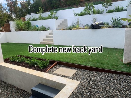 Retaining Walls - This wall was built to retain their hill and to make more room for the yard. By building this wall, the owners are able to build a new ADU.