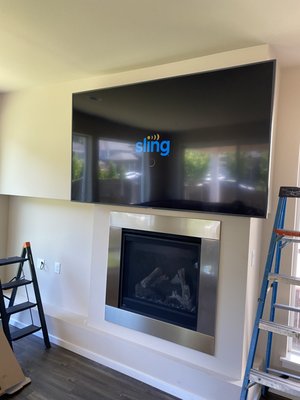 TV Installation - This projects were included in mounting a 82" TV above the fireplace and running the cord behind wall.