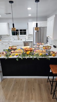 Tiered grazing table with sandwich add on - Elevate your event—literally—with our Tiered Grazing Table, a stunning multi-level display of gourmet cheeses, premium cured meats, fresh fruits, nuts, artisan crackers, and decadent accompaniments. Designed to add depth and dimension to your spread, this beautifully styled setup maximizes space while creating a show-stopping visual and culinary experience. Perfect for weddings, corporate events, and upscale gatherings, our tiered grazing table is crafted to impress and indulge your guests with every bite. Tiered grazing table with sandwich add on - Elevate your event—literally—with our Tiered Grazing Table, a stunning multi-level display of gourmet cheeses, premium cured meats, fresh fruits, nuts, artisan crackers, and decadent accompaniments. Designed to add depth and dimension to your spread, this beautifully styled setup maximizes space while creating a show-stopping visual and culinary experience. Perfect for weddings, corporate events, and upscale gatherings, our tiered grazing table is crafted to impress and indulge your guests with every bite.