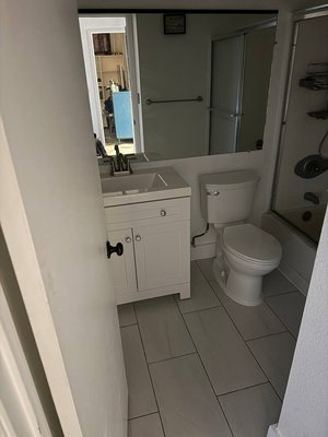 Bathroom renovation - This bathroom renovation included updating the flooring, replacing the vanity, installing a new toilet, and upgrading all fixtures. The walls were repaired and refinished to improve the overall look and durability. The goal was to refresh the space and bring it up to date with a clean, modern feel that matches the rest of the home.

We include photos of the materials used in this project, along with approximate pricing options. Every client can choose materials that fit their style and budget. We work closely with homeowners to help select suitable finishes and provide flexible options to achieve the desired result.