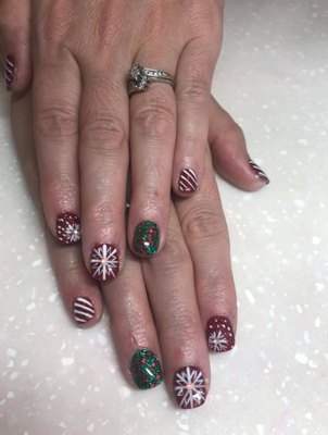 Holiday Inspired Nails - Our technicians have the talent to make all of your nail goals to come true! We offer a variety of services from acrylics, dip powder, gel, and regular manicures. Holiday Inspired Nails - Our technicians have the talent to make all of your nail goals to come true! We offer a variety of services from acrylics, dip powder, gel, and regular manicures.