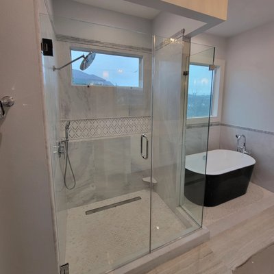 Frameless Shower Glass Doors - At Euro Custom Glass Interiors, our frameless glass shower doors are the perfect blend of modern elegance and functional design. Crafted from premium, thick tempered glass, these doors create a sleek, open feel that enhances any bathroom while showcasing tilework and maximizing light. With no bulky frames to interrupt the view, our frameless showers offer a clean, minimalist look that adds value and sophistication to your space. Every enclosure is custom-measured and expertly installed to ensure a flawless fit and watertight seal. Whether you’re building new or remodeling, Euro Custom Glass Interiors transforms ordinary bathrooms into spa-like retreats. Frameless Shower Glass Doors - At Euro Custom Glass Interiors, our frameless glass shower doors are the perfect blend of modern elegance and functional design. Crafted from premium, thick tempered glass, these doors create a sleek, open feel that enhances any bathroom while showcasing tilework and maximizing light. With no bulky frames to interrupt the view, our frameless showers offer a clean, minimalist look that adds value and sophistication to your space. Every enclosure is custom-measured and expertly installed to ensure a flawless fit and watertight seal. Whether you’re building new or remodeling, Euro Custom Glass Interiors transforms ordinary bathrooms into spa-like retreats.