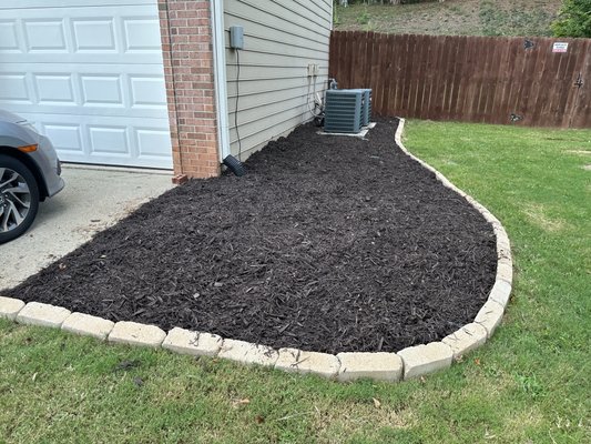 Mulch & Landscape - This is a mulching in rock installation. Mulch & Landscape - This is a mulching in rock installation.