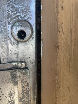 Old commercial door lockout - This project took place in north Austin at a hardware store, one of the doors was old and the locked mechanism was stuck so we couldn’t open the door regular and had to gain access to the bolt itself from the gap we had between the door and the frame