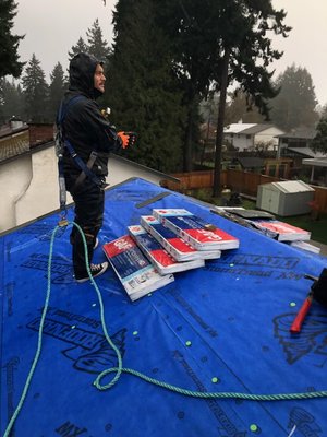 Asphalt roof replacement in Colwood - When we install your new roof, we make sure ALL existing roofing materials are torn off. We then prep the roof using an underlayment system that is 100% waterproof, then install all new flashings, vents, boots, skylights, etc. Then, of course, install our signature GAF 50-year shingles. We then do a full site clean up including magnet raking the entire premises.