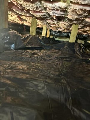 Crawlspace Project in Lacey, WA - Crawlspace restoration including new insulation using lath, new vapor barrier, and new ducts
