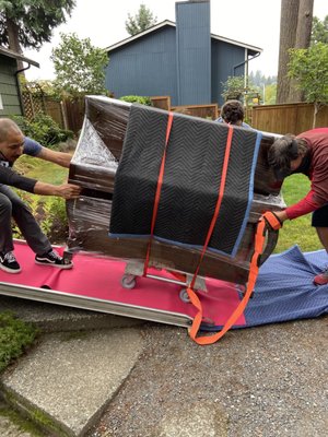 Piano moving - This upright piano needed to go on the main floor. With 5 steps to contend with. We used the ramp from our box truck and deployed it on top of the steps. Like anything else. They're many ways to skin a cat. We choose the best option with 3 things in mind. The safety of our crew. What's the best way to minimize damage to property and item being moved. Piano moving - This upright piano needed to go on the main floor. With 5 steps to contend with. We used the ramp from our box truck and deployed it on top of the steps. Like anything else. They're many ways to skin a cat. We choose the best option with 3 things in mind. The safety of our crew. What's the best way to minimize damage to property and item being moved.