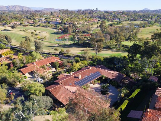 54 Panel Award-Winning Rancho Santa Fe Installation - The 54 panel system includes SunPower X21-345-AC modules with 54 SunPower –ACPV micro inverters and Invisimount racking. We also added a 240V outlet for EV charging of the customers new Tesla.
The customer delegated the search for a solar installer to his high school age son who did all the research and narrowed down the field to three finalists including SunPower by Stellar Solar. We were selected based on our twenty years of experience that includes many high-end residential installations, and consistent status as San Diego’s Best Solar company in the Union Tribune Readers poll.
Those same attributes won over his dad who was the ultimate decision maker.
Jobs like this are all about the details and this project had some unique challenges. In order to install on this roof we needed to do a composite shingle underlay.
That's nothing we're unfamiliar with BUT the part where it became tricky was where you enter the vestibule from the courtyard the underside had no tongue and groove.
The tiles were exposed on the bottom side. This area was about 5 feet in depth and spanned into the vestibule from the eave edge. Here we needed to match the existing tongue and and groove.
Sounds easy right?
This is a custom home build in San Diego and all the wood was rough cut and had that distressed look, This made finding the correct materials difficult.
The new tongue and groove was custom milled then sand blasted to match what was currently Installed on the house.
Our team was also able to conceal this giant inch and a quarter conduit on the roof. We were actually able to traverse up the roof under the tile to an LB conduit body where we then entered the attic to keep the conduit out of site giving this array that true Invisimount look!
The customer was thrilled with the end result and was even more excited to be selected as the winner of the 2018 SunPower National Intelegant award for Excellence. 54 Panel Award-Winning Rancho Santa Fe Installation - The 54 panel system includes SunPower X21-345-AC modules with 54 SunPower –ACPV micro inverters and Invisimount racking. We also added a 240V outlet for EV charging of the customers new Tesla.
The customer delegated the search for a solar installer to his high school age son who did all the research and narrowed down the field to three finalists including SunPower by Stellar Solar. We were selected based on our twenty years of experience that includes many high-end residential installations, and consistent status as San Diego’s Best Solar company in the Union Tribune Readers poll.
Those same attributes won over his dad who was the ultimate decision maker.
Jobs like this are all about the details and this project had some unique challenges. In order to install on this roof we needed to do a composite shingle underlay.
That's nothing we're unfamiliar with BUT the part where it became tricky was where you enter the vestibule from the courtyard the underside had no tongue and groove.
The tiles were exposed on the bottom side. This area was about 5 feet in depth and spanned into the vestibule from the eave edge. Here we needed to match the existing tongue and and groove.
Sounds easy right?
This is a custom home build in San Diego and all the wood was rough cut and had that distressed look, This made finding the correct materials difficult.
The new tongue and groove was custom milled then sand blasted to match what was currently Installed on the house.
Our team was also able to conceal this giant inch and a quarter conduit on the roof. We were actually able to traverse up the roof under the tile to an LB conduit body where we then entered the attic to keep the conduit out of site giving this array that true Invisimount look!
The customer was thrilled with the end result and was even more excited to be selected as the winner of the 2018 SunPower National Intelegant award for Excellence.