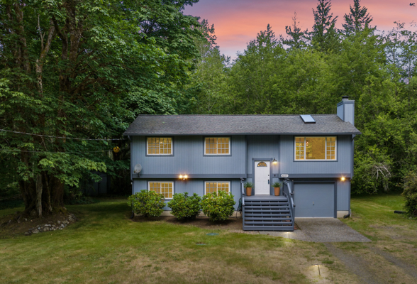4557 Big Beef Crossing, Bremerton - Beautiful, peaceful home in the Lake Symington community with a bubbling stream in the backyard and a short walk to the Lakefront park! Make yourself at home in this well kept split level on over a half acre of sprawling flat lawn. Upstairs living room overlooks front lawns, and kitchen & dining room look out over the woods and the creek out back. 3 upstairs bedrooms down the hall with a main shared bathroom. Laundry room and garage access downstairs and a big second living room complete with wet bar/second kitchen area for hosting or MIL set up. Ideal private rural lifestyle home with large level lot. Walk down to the lake for swimming, fishing or just a park day!