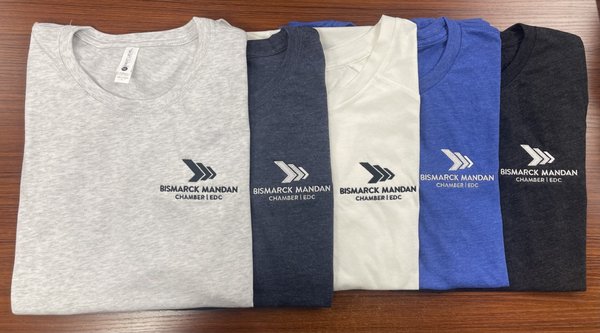 Bismarck Mandan Chamber EDC Apparel - We created an online temporary pop-up store for the chamber staff to shop from. Once the store closed, Go Promo produced the gear in bulk and sorted by who ordered what to make for an easy delivery and distribution. Bismarck Mandan Chamber EDC Apparel - We created an online temporary pop-up store for the chamber staff to shop from. Once the store closed, Go Promo produced the gear in bulk and sorted by who ordered what to make for an easy delivery and distribution.