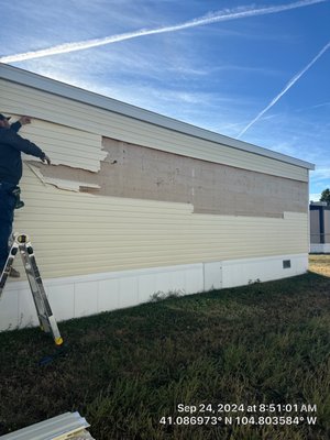 Siding Repair - Removing and replacing damaged individual vinyl siding panels that have been cracked, punctured, or discolored. Siding Repair - Removing and replacing damaged individual vinyl siding panels that have been cracked, punctured, or discolored.