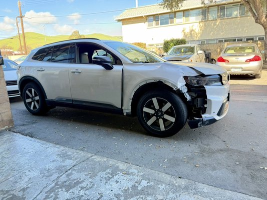 HONDA EV repair - This customer arrived with an impact to a light pole. We got straight to work, and now it’s unrecognizable from the damage and looks brand new.