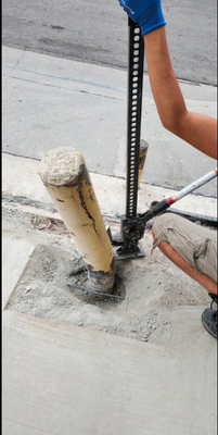 Safety Bollard Repair - Repair damaged bollard by semi-truck. Removed old bent bollard and install new 5" diameter steel round tubing post, safety yellow oil paint Safety Bollard Repair - Repair damaged bollard by semi-truck. Removed old bent bollard and install new 5" diameter steel round tubing post, safety yellow oil paint