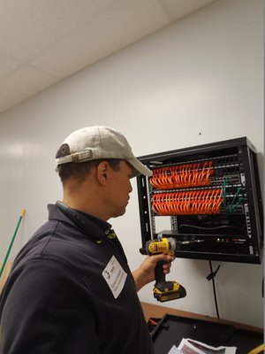Network Cabling for a Firearms and Munitions Testing Site. - This project involved installation, termination, and testing of 100+ Cat6 drops from multiple test and video surveillance locations in six firearms and munitions ranges throughout the building. All of the cables arriving to the IDF (network Cabinet with patch panels, managed switches, and power supply that we would also install); with two additional drops installed to the MDF in the Network Closet at the front of the building. Network Cabling for a Firearms and Munitions Testing Site. - This project involved installation, termination, and testing of 100+ Cat6 drops from multiple test and video surveillance locations in six firearms and munitions ranges throughout the building. All of the cables arriving to the IDF (network Cabinet with patch panels, managed switches, and power supply that we would also install); with two additional drops installed to the MDF in the Network Closet at the front of the building.