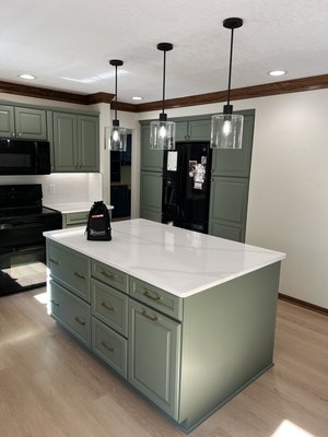 John and Audrey custom cabinet color change. - John and Audrey wanted to freshen up their space to something more fun.  We tinted our N-Hance paint specially formulated for cabinets to Sherwin Williams Dried Thyme color.  All was then protected with a UV cured matte clear-coat to last for years to come!