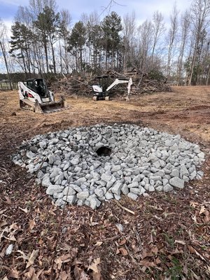 Rip-Rap Installation - This was a 4 acre clear and land development job we did in the summer of 2003. Rip-Rap Installation - This was a 4 acre clear and land development job we did in the summer of 2003.
