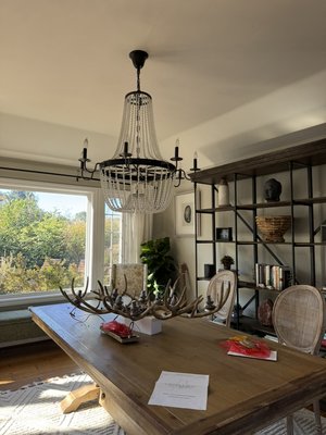Rustic Antler Chandelier Installation - Installed a unique deer antler chandelier to replace an old fixture. The project included safe removal of the outdated chandelier, preparing the wiring, and securely installing the new rustic-style lighting above the dining table, enhancing the room’s cozy atmosphere.