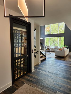 Home Elevators - Home elevators, also known as residential home elevators, are an elegant method of providing convenience and accessibility for homeowners planning a new home or remodel.Home elevators allow you to build up rather than out, all without worrying about tackling the stairs in the case of future mobility challenges. Arrow Lift offers you a simple and easy way of moving safely between floors with professional home elevator installation. Home elevators are a luxurious addition to your home that provide both accessibility and sophistication. Our home elevators are completely customizable, allowing you to choose each element that suits your home’s design and aesthetic. Let our 40+ years of experience guide you through this process! Home Elevators - Home elevators, also known as residential home elevators, are an elegant method of providing convenience and accessibility for homeowners planning a new home or remodel.Home elevators allow you to build up rather than out, all without worrying about tackling the stairs in the case of future mobility challenges. Arrow Lift offers you a simple and easy way of moving safely between floors with professional home elevator installation. Home elevators are a luxurious addition to your home that provide both accessibility and sophistication. Our home elevators are completely customizable, allowing you to choose each element that suits your home’s design and aesthetic. Let our 40+ years of experience guide you through this process!
