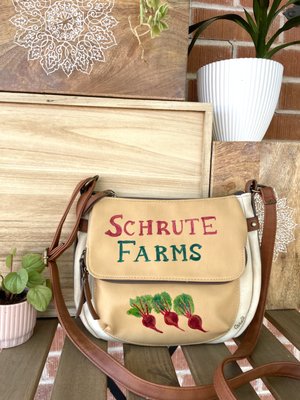 Schrute Farms - This bag is one of a kind, hand painted on a thrifted purse. Shop sustainably with style, sporting a bag celebrating TV's favorite beet farmer. Schrute Farms - This bag is one of a kind, hand painted on a thrifted purse. Shop sustainably with style, sporting a bag celebrating TV's favorite beet farmer.