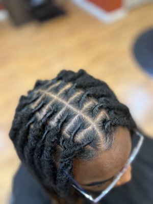 Locs & Styles - Loc Maintenance consists of starting, washing, retwisting, styling, trimming, repairing, and/or detoxing dreadlocks. The goal is to restore locs, manage new growth, and support healthy hair. If any of these services interest, please feel free to schedule your free consultation today! Locs & Styles - Loc Maintenance consists of starting, washing, retwisting, styling, trimming, repairing, and/or detoxing dreadlocks. The goal is to restore locs, manage new growth, and support healthy hair. If any of these services interest, please feel free to schedule your free consultation today!