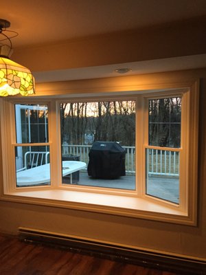 Bay Window - Replaced an old inefficient wood window with a new Bay Window with grids. Insulated seat board for energy efficiency. Bay Window - Replaced an old inefficient wood window with a new Bay Window with grids. Insulated seat board for energy efficiency.