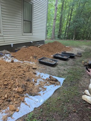 Foundation Stabilized with Push Piers - This home was showing signs of foundation settlement, including cracks in interior walls and cinder block foundation walls. Our team installed professionally engineered push piers to stabilize the foundation and help prevent further movement, providing the homeowner with a stronger and more secure foundation. Foundation Stabilized with Push Piers - This home was showing signs of foundation settlement, including cracks in interior walls and cinder block foundation walls. Our team installed professionally engineered push piers to stabilize the foundation and help prevent further movement, providing the homeowner with a stronger and more secure foundation.