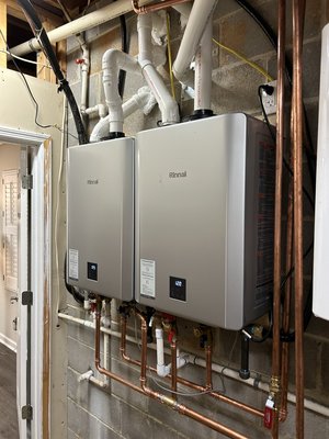 New natural gas tankless water heater install  - The pre-existing natural gas tankless water heater was undersized and hadn’t been regularly maintenance and resulted in the loss of consistent hot water. We resized the unit based off of their fixtures and installed (2) natural gas tankless water heaters piggybacked with recirculating pump and pump controller New natural gas tankless water heater install  - The pre-existing natural gas tankless water heater was undersized and hadn’t been regularly maintenance and resulted in the loss of consistent hot water. We resized the unit based off of their fixtures and installed (2) natural gas tankless water heaters piggybacked with recirculating pump and pump controller