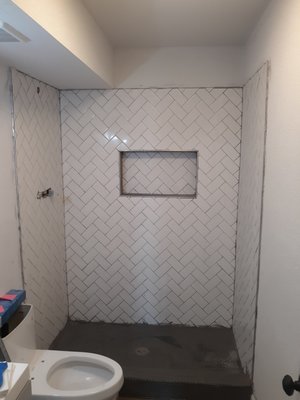 Bathroom remodel - I fully renovated a condo and here is one of the before and after pictures of the guest bathroom shower.