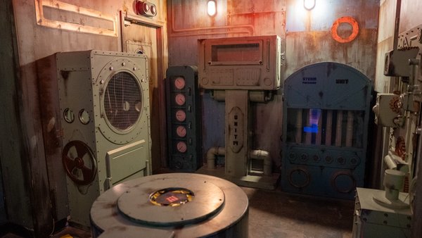 Steampunk Submarine Escape Room - You and your team of specialist engineers have been hired to perform urgent maintenance on a mysterious, ancient submarine. The vessel has been running for years without fuel, almost as if it’s alive. However, over the last few months, it’s slowed down significantly. The captain needs your help to fix it, but there’s one problem, the original engineer who built this masterpiece is long gone.
As you explore, the submarine begins to malfunction, locking you inside. The pressure is rising and the vessel is sinking fast. You have just 60 minutes to repair the systems and get the submarine moving again, or risk being trapped at the bottom of the sea.
Steampunk Submarine is a multi-room experience with an exploratory feel. It gives players an unfolding adventure as they move through each system of the submarine. Are you ready to SUBmerse yourselves in this exciting room? Steampunk Submarine Escape Room - You and your team of specialist engineers have been hired to perform urgent maintenance on a mysterious, ancient submarine. The vessel has been running for years without fuel, almost as if it’s alive. However, over the last few months, it’s slowed down significantly. The captain needs your help to fix it, but there’s one problem, the original engineer who built this masterpiece is long gone.
As you explore, the submarine begins to malfunction, locking you inside. The pressure is rising and the vessel is sinking fast. You have just 60 minutes to repair the systems and get the submarine moving again, or risk being trapped at the bottom of the sea.
Steampunk Submarine is a multi-room experience with an exploratory feel. It gives players an unfolding adventure as they move through each system of the submarine. Are you ready to SUBmerse yourselves in this exciting room?