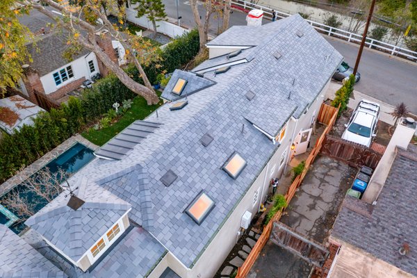 DaVinci Slate Roof - This beautiful house was undergoing a major remodel and Factor Roofing was in charge of the roof installation. We removed all the old tile, replaced the deck with new 1/2" CDX plywood, installed two layers of underlayment, and then installed the DaVinci Slate Roof Tiles along with brand new gutter system and Velux Skylights. This job took about 8 weeks from start to finish and the warranty on the materials is up to 50 years, one of the longest lasting materials on the market.
Copy and paste this link to your browser to watch the video: https://vimeo.com/960944458?share=copy DaVinci Slate Roof - This beautiful house was undergoing a major remodel and Factor Roofing was in charge of the roof installation. We removed all the old tile, replaced the deck with new 1/2" CDX plywood, installed two layers of underlayment, and then installed the DaVinci Slate Roof Tiles along with brand new gutter system and Velux Skylights. This job took about 8 weeks from start to finish and the warranty on the materials is up to 50 years, one of the longest lasting materials on the market.
Copy and paste this link to your browser to watch the video: https://vimeo.com/960944458?share=copy