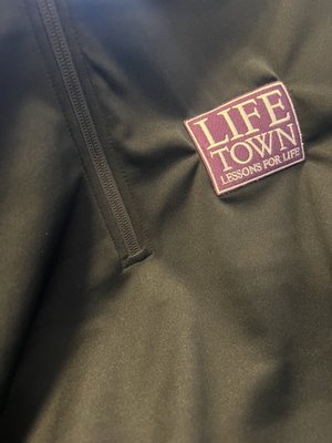 LifeTown custom embroidered quarter zip jackets - Promo on 4th was honored to collaborate with LifeTown, an organization dedicated to supporting individuals with special needs. Our task was to create custom embroidered quarter zip jackets for their volunteers to wear at an upcoming gala for their donors. LifeTown custom embroidered quarter zip jackets - Promo on 4th was honored to collaborate with LifeTown, an organization dedicated to supporting individuals with special needs. Our task was to create custom embroidered quarter zip jackets for their volunteers to wear at an upcoming gala for their donors.