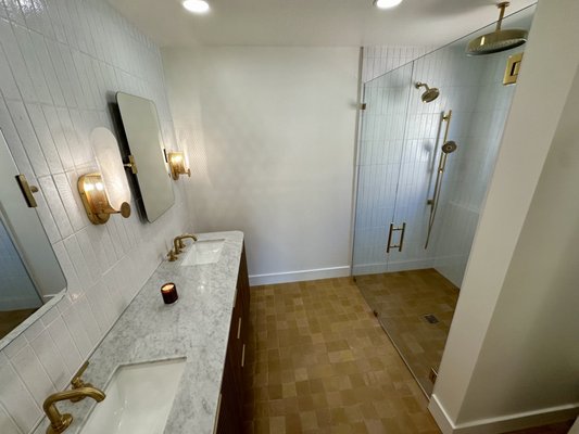 Jason bathroom remodel - This project was done in Phoenix if you notice the door going into the bathroom was not squared up in the room removed the door to square the bathroom to have more room. Every small tile was hand laid. All the tile was laid in a specific order. The customer wanted it. It was installed behind the toilet backsplash and shower walls. Another cool feature is a curly shower. Nothing to step into bathroom floor flows right into a pitched shower floor. Jason bathroom remodel - This project was done in Phoenix if you notice the door going into the bathroom was not squared up in the room removed the door to square the bathroom to have more room. Every small tile was hand laid. All the tile was laid in a specific order. The customer wanted it. It was installed behind the toilet backsplash and shower walls. Another cool feature is a curly shower. Nothing to step into bathroom floor flows right into a pitched shower floor.