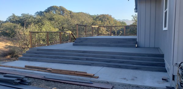 New custom deck construction - this custom deck was built to extend outdoor living space with a clean, modern design. Featuring durable materials, detailed craftsmanship, and a layout tailored to the home, it creates the perfect balance of function and style for entertaining and relaxation