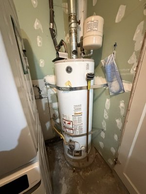 Tankless conversion - Gas water tank removed for new tankless install. Tankless conversion - Gas water tank removed for new tankless install.